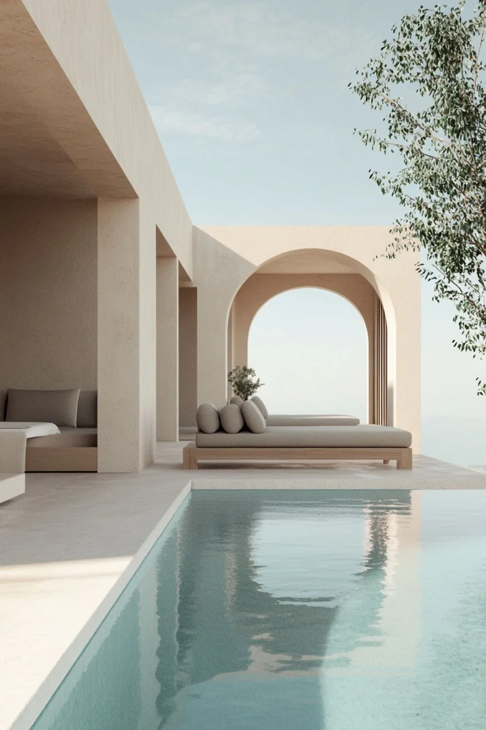 Açık ton microcement yüzeyli havuz terası ve oturma alanı
